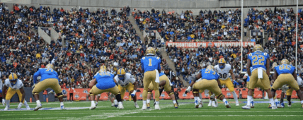 Bruins Offense lines up during UCLA Bowl Game Photo Credit: Shayne Smith