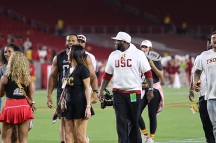 USC Trojans Recruiting: 4-Star 2026 Defensive Lineman Commits, Shuts Down Recruitment 2 USC Trojans Co-Defensive Coordinator Eric Henderson With Aaron Donald After The USC Trojans Beat Utah State At The Coliseum. USC Recruiting