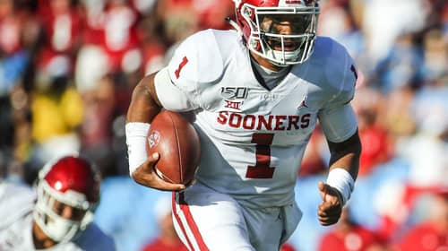 Oklahoma Sooners quarterback Jalen Hurts (1) runs for a 30-yard touchdown on 4th down and 3 to give Oklahoma a 7-0 lead in the first quarter; Oklahoma defeated UCLA 48-14, Sept 14, 2019, Pasadena, CA. Photo Credit: Steve Cheng | Under Creative Commons License