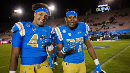 UCLA Bruins linebacker Shea Pitts (47) and running back Joshua Kelley (27) after the game against Cal; Cal at UCLA, November 30, 2019, Los Angeles, CA. Photo Credit: Steve Cheng | Under Creative Commons License