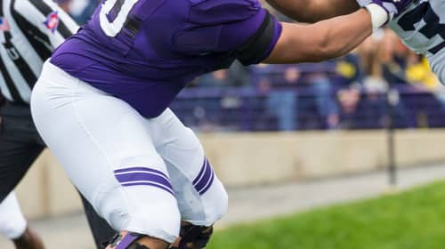 Northwester Offensive Lineman Rashawn Slater. Photo Credit: Maize & Blue Nation | Under Creative Commons License