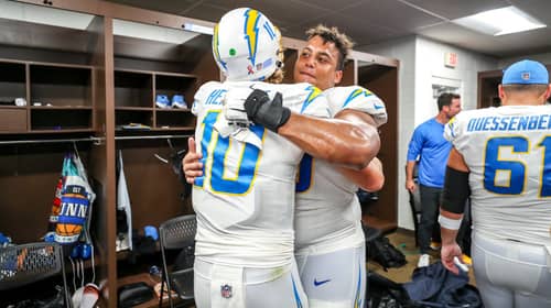 Justin Herbert and Rashawn Slater Celebrate After A Win In Washington. Photo Credit: Los Angeles Chargers On Twitter