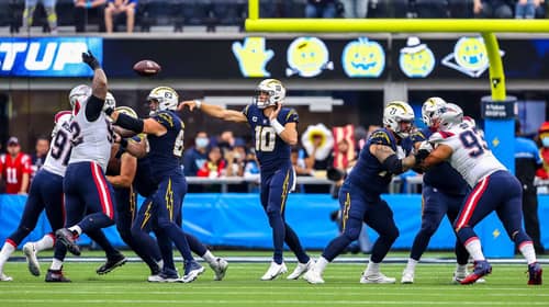 Los Angeles Chargers Quarterback Justin Herbert Against The New England Patriots. Photo Credit: Mike Nowak | Los Angeles Chargers