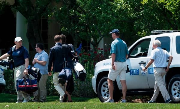 Manning Golfs With Trump