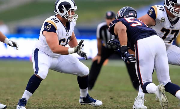 LOS ANGELES, CA - NOVEMBER 12: Austin Blythe #66 of the Los Angeles Rams blocks during the first half of game against the Houston Texans at Los Angeles Memorial Coliseum on November 12, 2017 in Los Angeles, California. (Photo by Sean M. Haffey/Getty Images)
