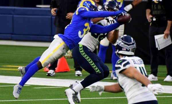 Defensive back Darious Williams #31 of the Los Angeles Rams intercept a pass intended for tight end Greg Olsen #88 of the Seattle Seahawks in the fourth quarter of a NFL football game at SoFi Stadium in Inglewood on Sunday, November 15, 2020. Los Angeles Rams won 23-16. (Photo by Keith Birmingham, Pasadena Star-News/SCNG)