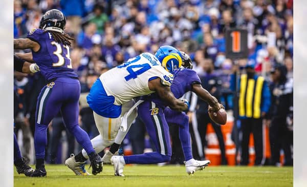 Los Angeles Rams Defensive Lineman A'Shawn Robinson Tackles Baltimore Ravens Quarterback Tyler Huntley. Photo Credit: Brevin Townsell | LA Rams
