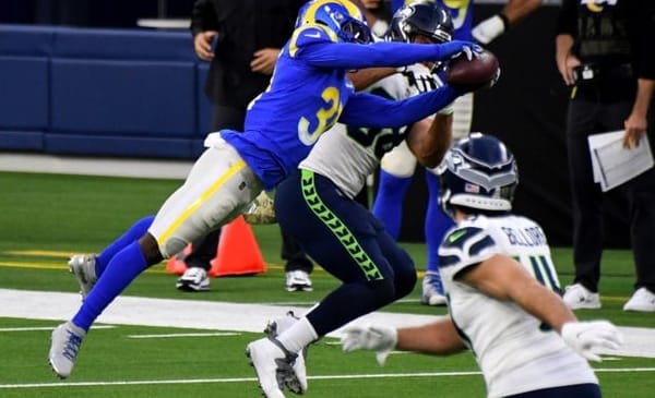 Defensive back Darious Williams #31 of the Los Angeles Rams intercept a pass intended for tight end Greg Olsen #88 of the Seattle Seahawks in the fourth quarter of a NFL football game at SoFi Stadium in Inglewood on Sunday, November 15, 2020. Los Angeles Rams won 23-16. (Photo by Keith Birmingham, Pasadena Star-News/SCNG)