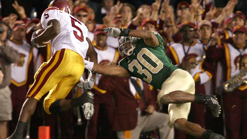 USC Football: Heisman Winner Says Reggie Bush Should 'Unequivocally. Without A Doubt.' Get His Heisman Trophy Back 4 NCAA 2005 Football: Southern California Trojans at Notre Dame Fighting Irish