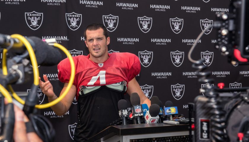 Oakland Raiders Quarterback Derek Carr speaks with the media after his practice in Napa Valley, Calif., August 7, 2018. U.S. Air Force photo by Louis Briscese via Creative Commons License.