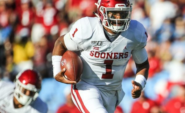 Oklahoma Sooners quarterback Jalen Hurts (1) runs for a 30-yard touchdown on 4th down and 3 to give Oklahoma a 7-0 lead in the first quarter; Oklahoma defeated UCLA 48-14, Sept 14, 2019, Pasadena, CA. Photo Credit: Steve Cheng | Under Creative Commons License