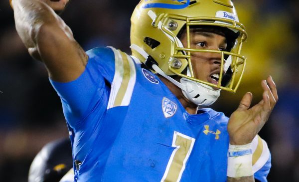 UCLA Bruins quarterback Dorian Thompson-Robinson (1) attempts a pass in the fourth quarter; Cal at UCLA, November 30, 2019, Los Angeles, CA. Photo Credit: Steve Cheng | Under Creative Commons License