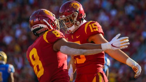 USC Trojans wide receiver Amon-Ra St. Brown (8) and Drake London celebrate after London's touchdown catch; UCLA at USC. November 23, 2019, Los Angeles, CA. Photo Credit: Steve Cheng | Under Creative Commons License