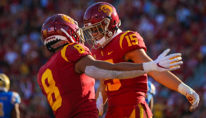 POLL: Who Is The Greatest USC Trojan Wide Receiver Of All Time? 2 USC Trojans wide receiver Amon-Ra St. Brown (8) and Drake London celebrate after London's touchdown catch; UCLA at USC. November 23, 2019, Los Angeles, CA. Photo Credit: Steve Cheng | Under Creative Commons License