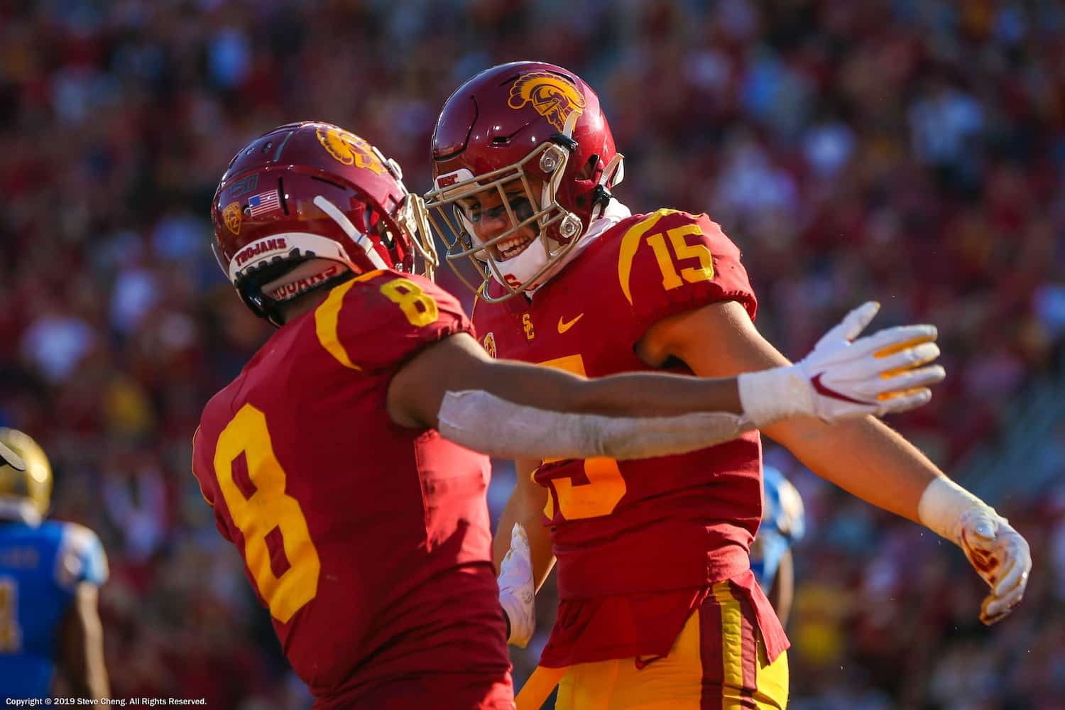 USC Trojans wide receiver Amon-Ra St. Brown (8) and Drake London celebrate after London's touchdown catch; UCLA at USC. November 23, 2019, Los Angeles, CA. Photo Credit: Steve Cheng | Under Creative Commons License