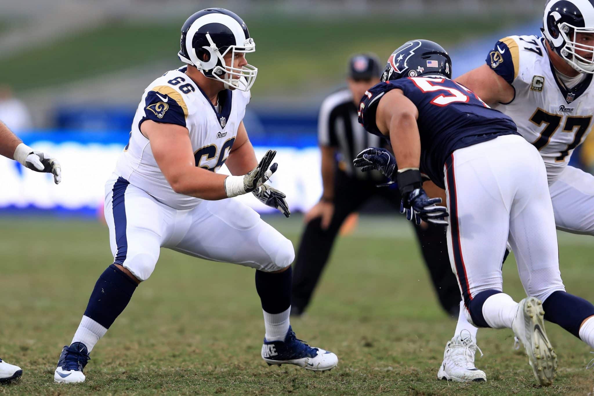 LOS ANGELES, CA - NOVEMBER 12: Austin Blythe #66 of the Los Angeles Rams blocks during the first half of game against the Houston Texans at Los Angeles Memorial Coliseum on November 12, 2017 in Los Angeles, California. (Photo by Sean M. Haffey/Getty Images)