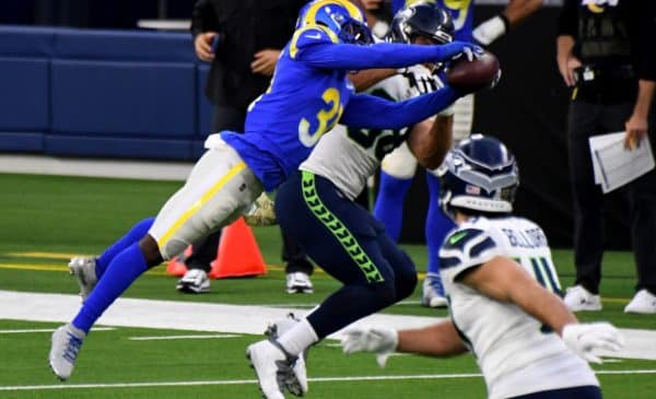 Defensive back Darious Williams #31 of the Los Angeles Rams intercept a pass intended for tight end Greg Olsen #88 of the Seattle Seahawks in the fourth quarter of a NFL football game at SoFi Stadium in Inglewood on Sunday, November 15, 2020. Los Angeles Rams won 23-16. (Photo by Keith Birmingham, Pasadena Star-News/SCNG)