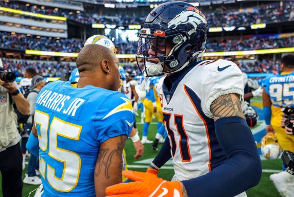 Los Angeles Chargers Cornerback Chris Harris Jr. And Denver Broncos Safety Justin Simmons Meet After The Game. Photo Credit: Ty Nowell | LA Chargers