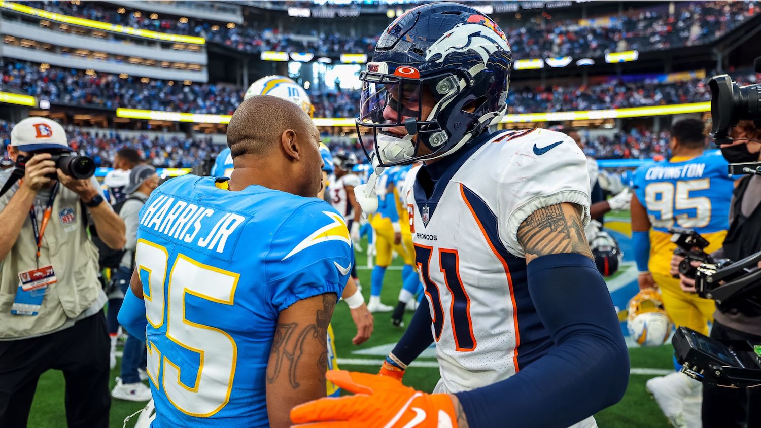 Los Angeles Chargers Cornerback Chris Harris Jr. And Denver Broncos Safety Justin Simmons Meet After The Game. Photo Credit: Ty Nowell | LA Chargers