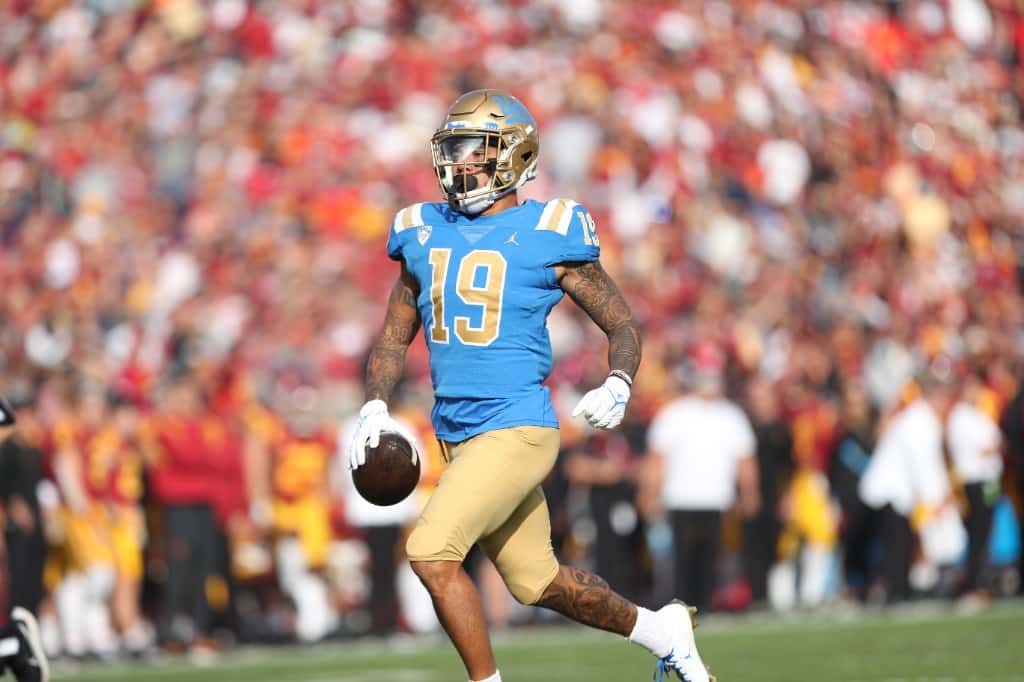 Kazmeir Allen heads into the end zone for his second TD of the afternoon in the first half against USC. Photo Credit: Jesus Ramirez | UCLA Athletics