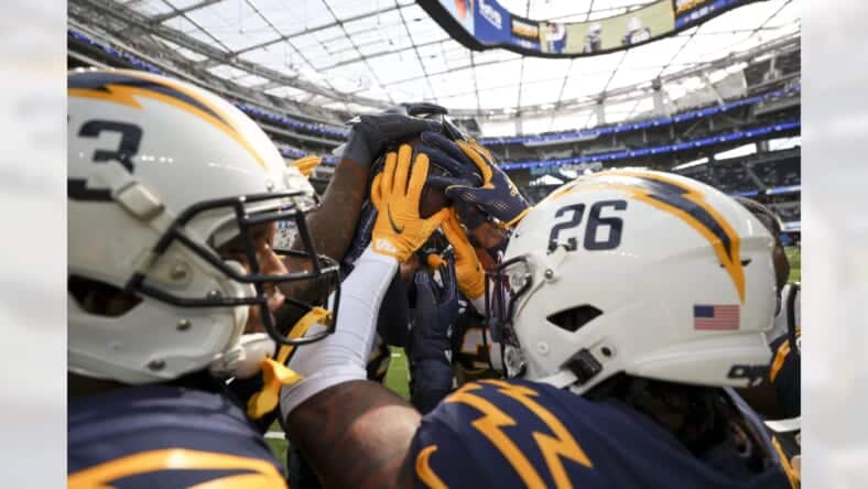 Chargers Huddle Before Game At SoFi Photo Credit: Mackenzine Hudson | Los Angeles Chargers