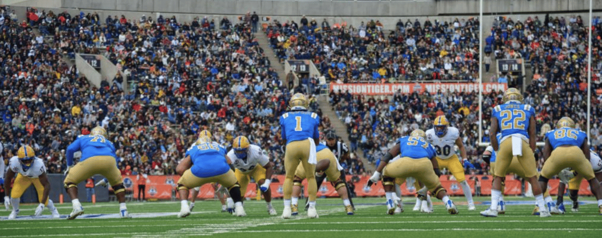 Bruins Offense lines up during UCLA Bowl Game Photo Credit: Shayne Smith