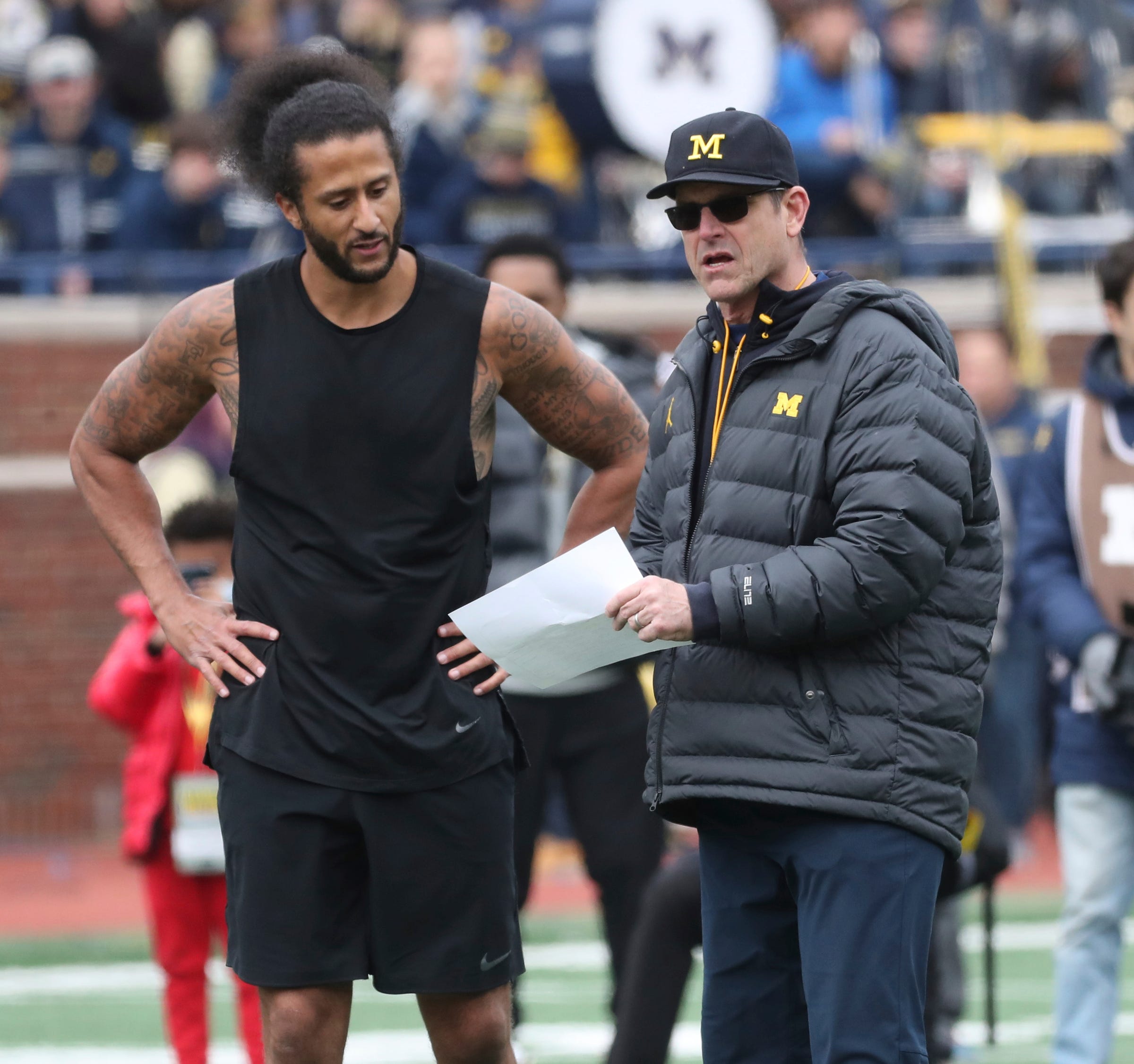 Does Colin Kaepernick Have A Future With The Los Angeles Chargers? 3 Syndication: Detroit Free Press | Los Angeles Chargers Head Coach Jim Harbaugh And Colin Kaepernick