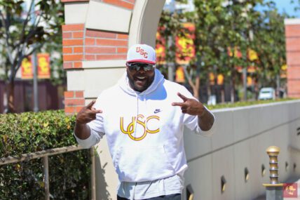 Coach Eric Henderson, USC Trojans Flip Tomuhini Topui